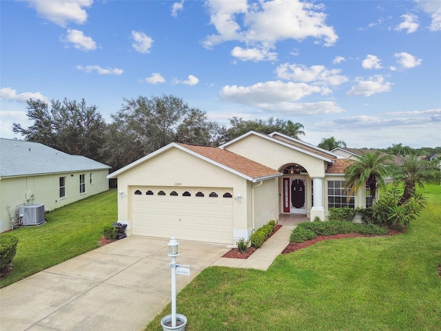 ranch-style home featuring a front yard, central AC unit, and a garage