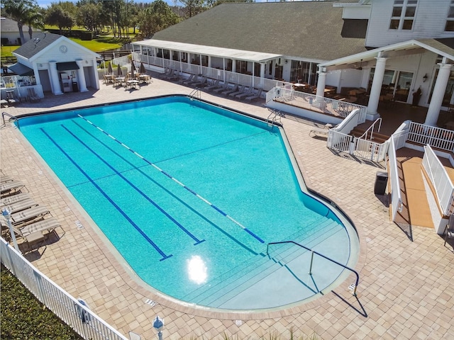 view of swimming pool featuring a patio area