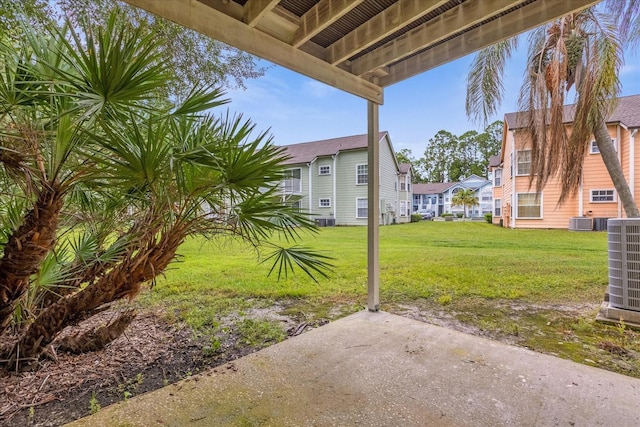 view of yard featuring central AC