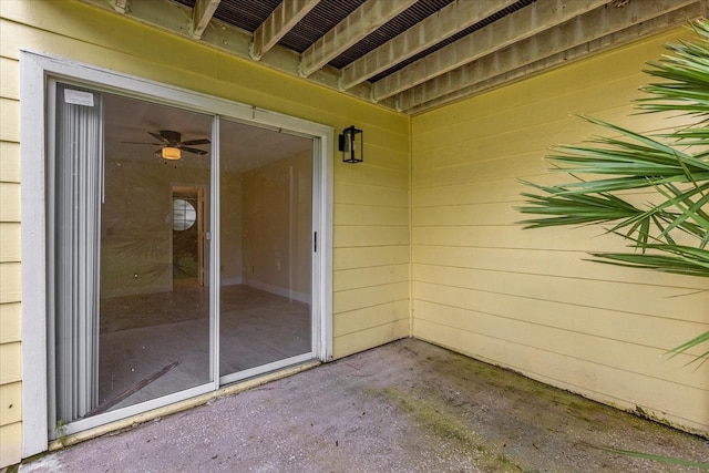 entrance to property with a patio area