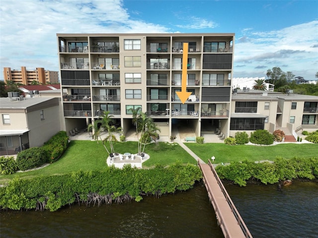 view of building exterior featuring a water view