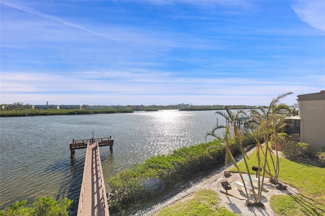 view of water feature with a dock