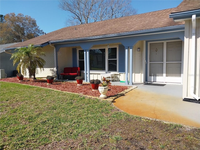 exterior space with a front yard