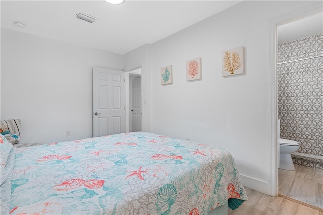 bedroom featuring light wood-type flooring