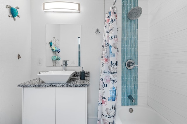 bathroom featuring shower / tub combo with curtain and vanity