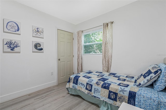 bedroom featuring hardwood / wood-style flooring