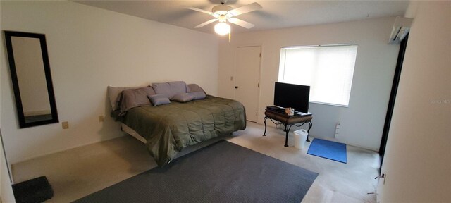 bedroom featuring light colored carpet, an AC wall unit, and ceiling fan