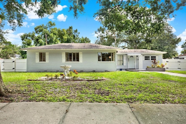 single story home featuring a front yard