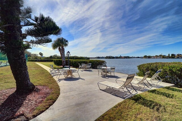 view of patio with a water view