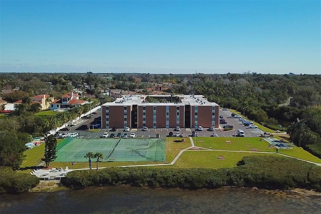 birds eye view of property featuring a water view