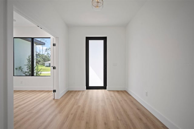 entryway with light hardwood / wood-style flooring