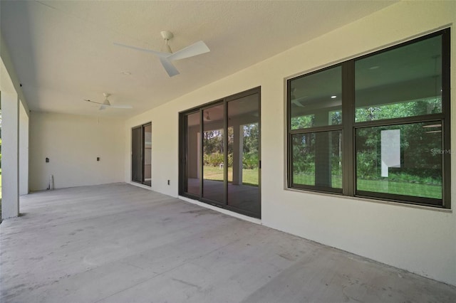 view of patio / terrace featuring ceiling fan