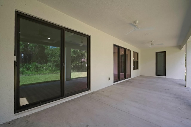 view of patio / terrace featuring ceiling fan