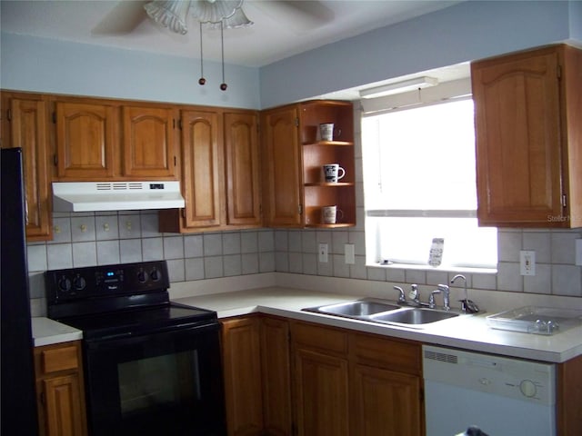 kitchen featuring black appliances, a wealth of natural light, sink, and ceiling fan