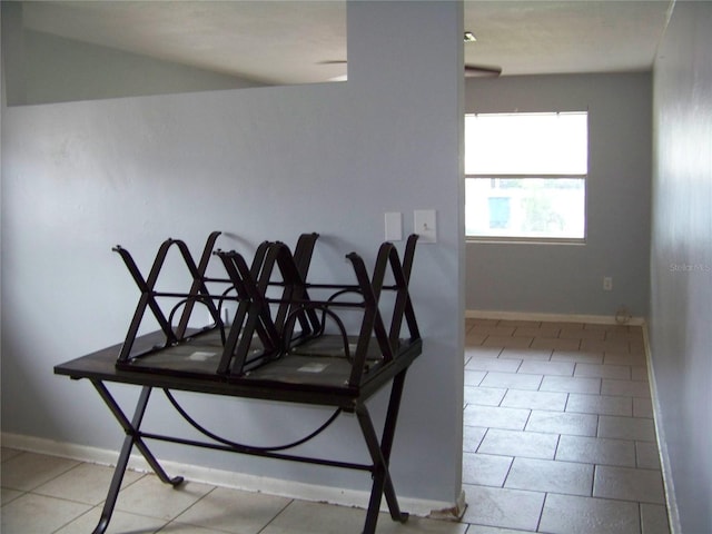 dining area featuring light tile patterned flooring