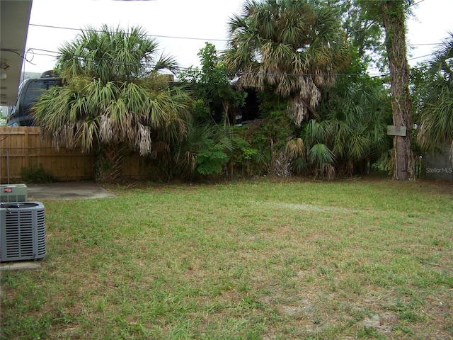 view of yard featuring central AC