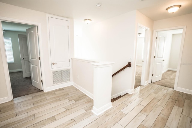 hall featuring light wood-type flooring