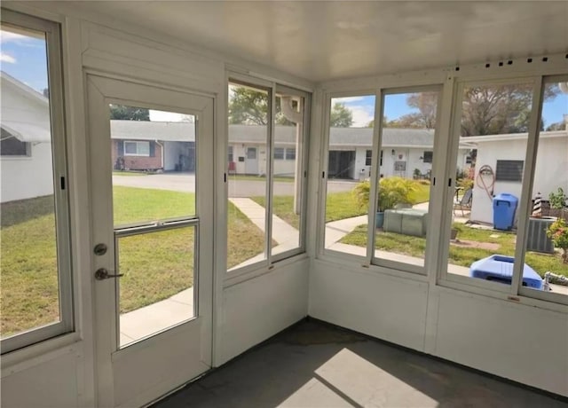 sunroom / solarium featuring plenty of natural light