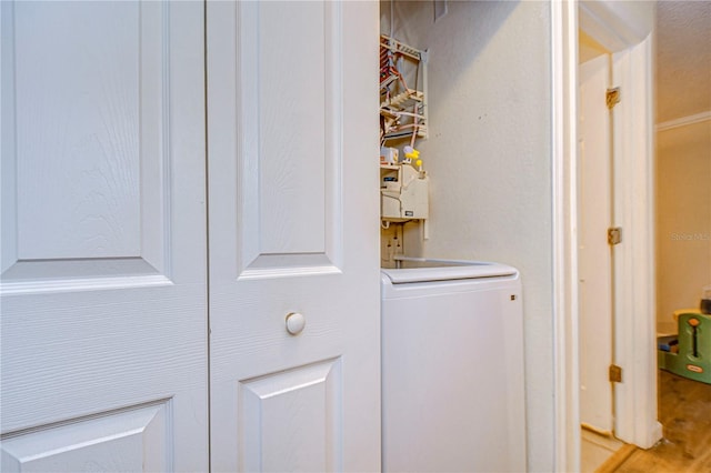 clothes washing area featuring washer / clothes dryer