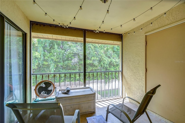 sunroom / solarium featuring a healthy amount of sunlight