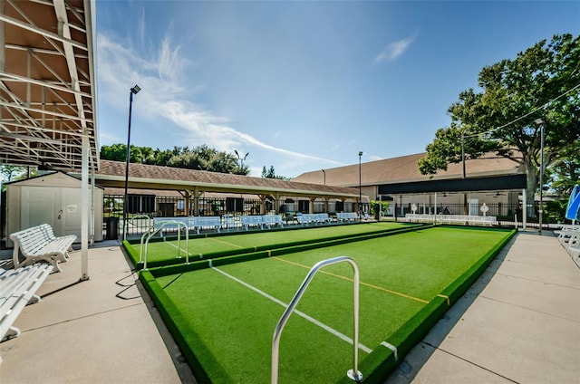 view of community featuring a storage unit