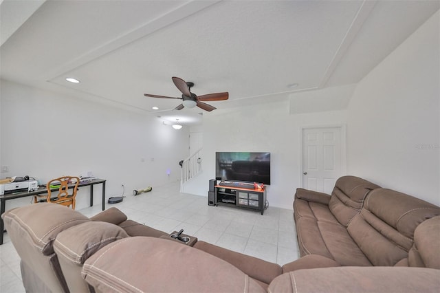 tiled living room featuring ceiling fan