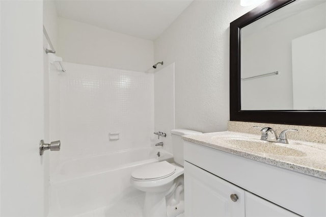 full bathroom featuring shower / bath combination, vanity, and toilet