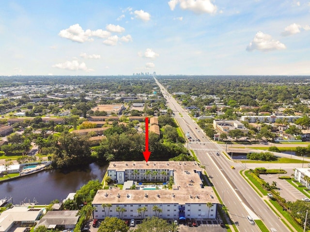 birds eye view of property featuring a water view