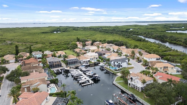 bird's eye view with a water view