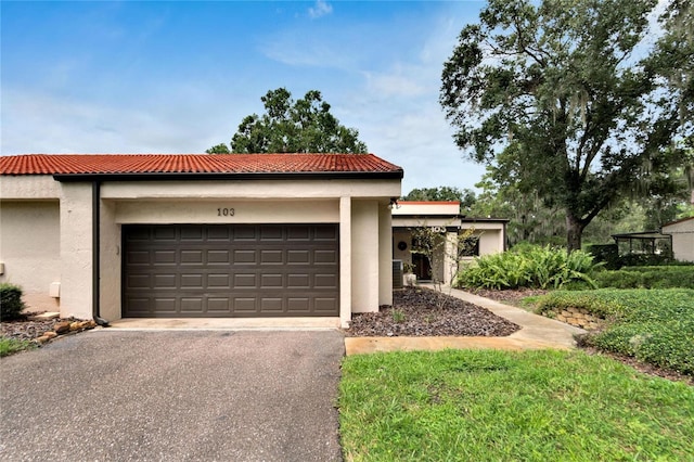 exterior space with a garage