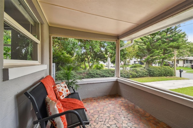 sunroom featuring a healthy amount of sunlight