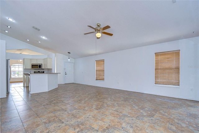 unfurnished living room with lofted ceiling and ceiling fan