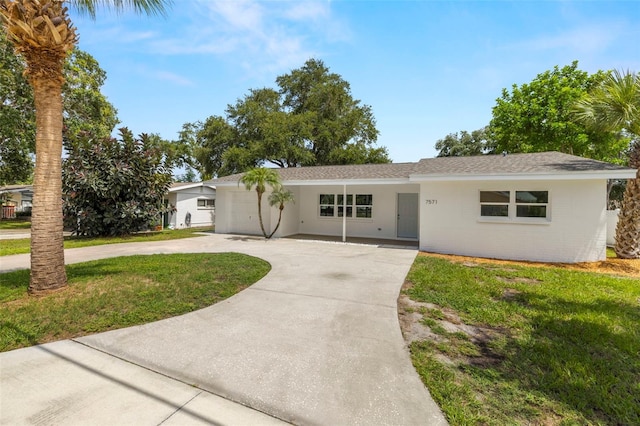 ranch-style home with a front yard