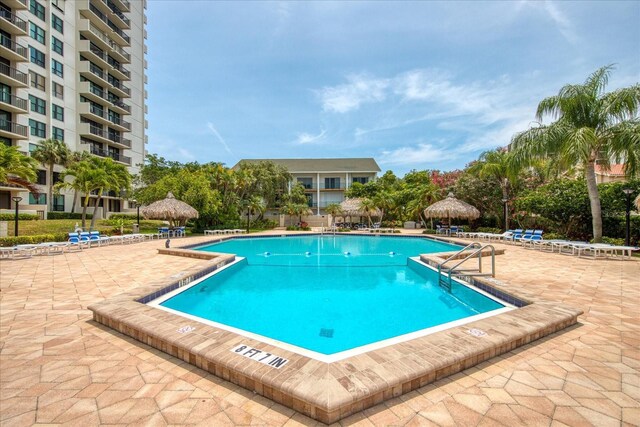 view of pool featuring a gazebo and a patio