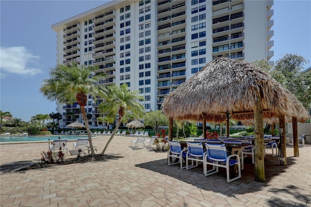 view of community featuring a gazebo, a patio area, and a swimming pool