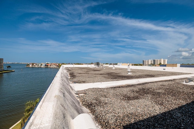 exterior space with a water view