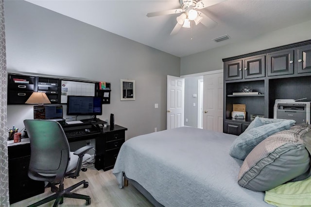 bedroom featuring light wood-type flooring and ceiling fan