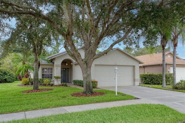 ranch-style house with a front yard and a garage