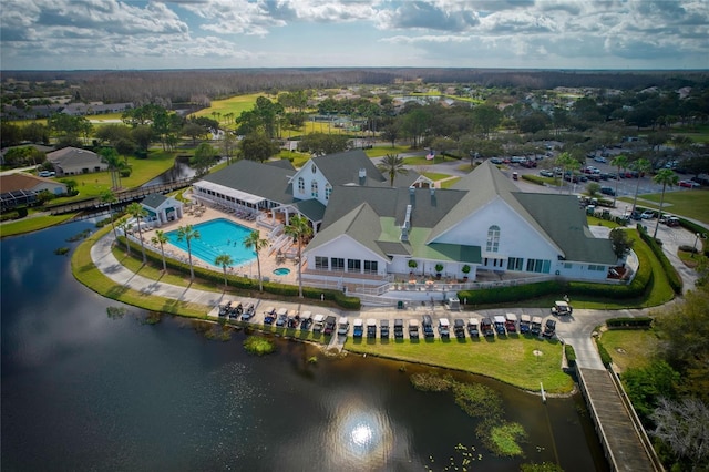 birds eye view of property featuring a water view