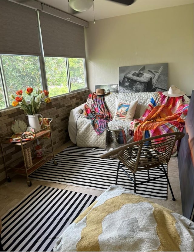 interior space with ceiling fan and a healthy amount of sunlight