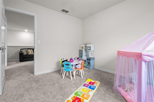 playroom with light colored carpet