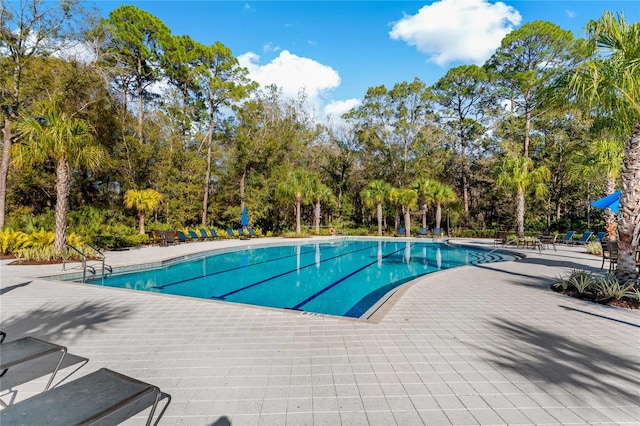 view of swimming pool featuring a patio