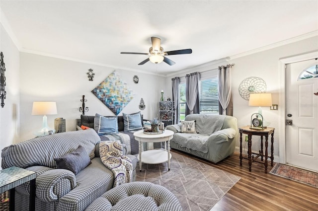 living room featuring ornamental molding, ceiling fan, and hardwood / wood-style flooring