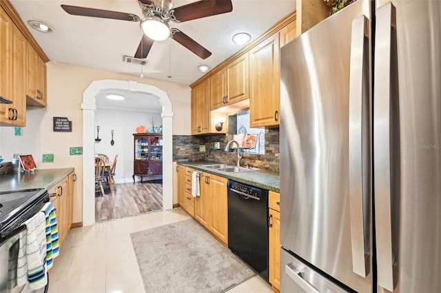 kitchen featuring ceiling fan, light tile patterned floors, sink, backsplash, and black appliances