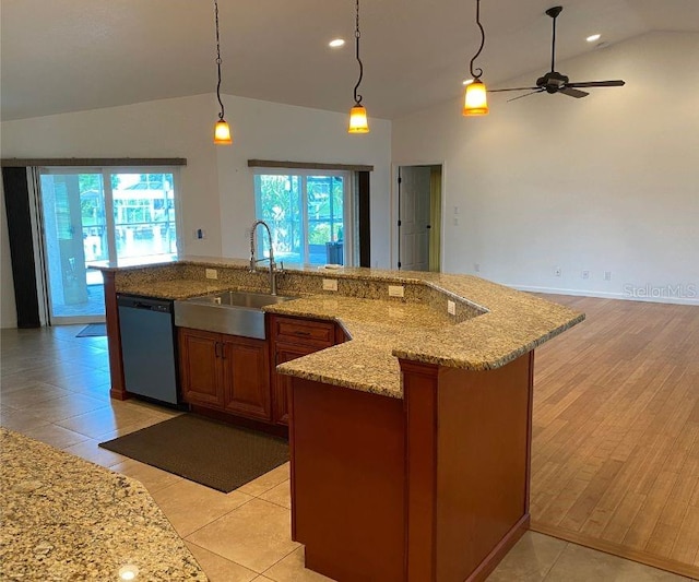 kitchen with decorative light fixtures, light hardwood / wood-style flooring, stainless steel dishwasher, lofted ceiling, and ceiling fan