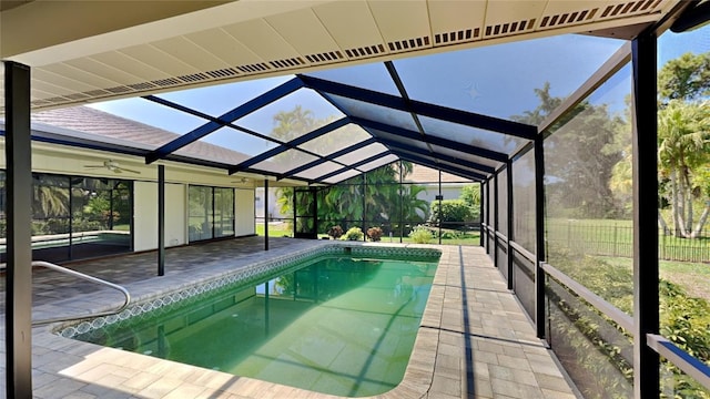 view of pool featuring a lanai and a patio