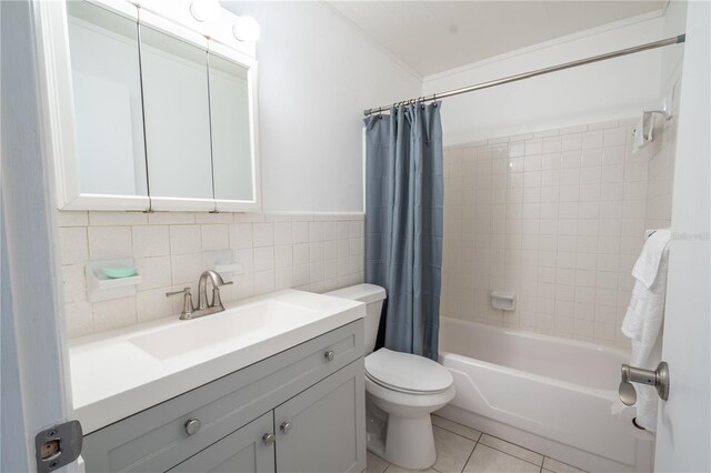 full bathroom with toilet, tile patterned flooring, vanity, backsplash, and shower / bath combo with shower curtain