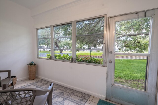 entryway with light tile patterned floors