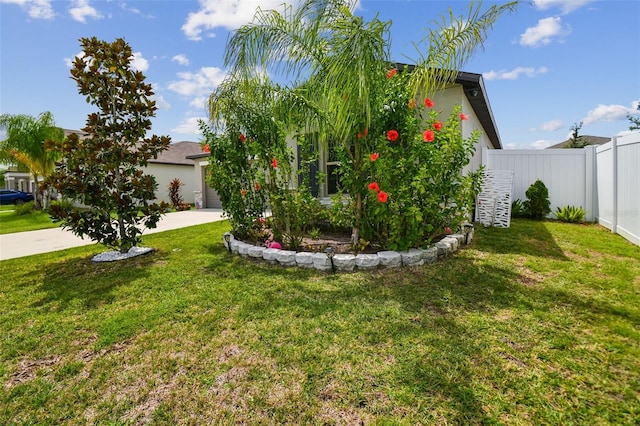 exterior space with a garage and a front yard