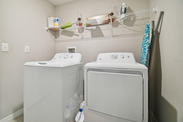 laundry room featuring washing machine and dryer